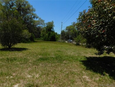 Mix of cleared areas and woods with huge old oaks