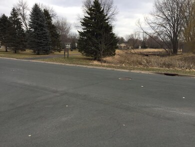 Park and pond with walking trails and playground n