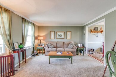 Updated carpet and neutral, calming green walls