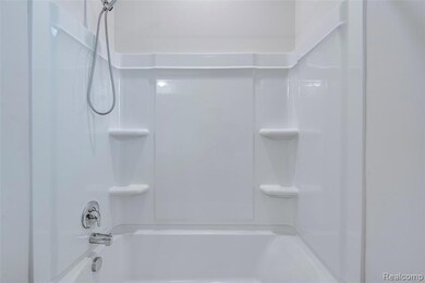 Bathroom featuring shower / washtub combination