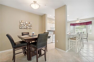 Tiled dining area with ceiling fan