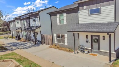 View of front of home featuring central air condit
