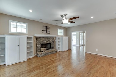 Livingroom-Custom built in bookcases and cozy fireplace