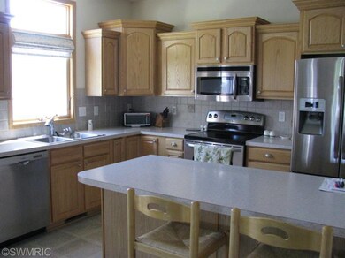 8318 Rockledge Way SW unit 15, Byron Center, MI 49315 - photo 5