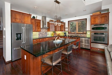 Kitchen with appliances with stainless steel finis