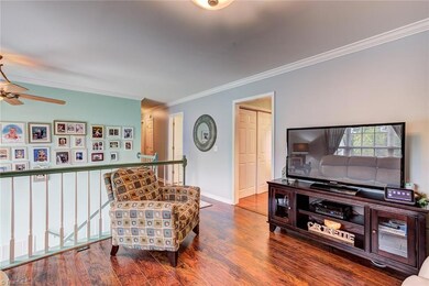 Upstairs living area leading to kitchen