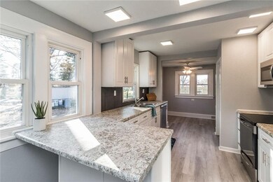 All new kitchen  w bar stool area.
