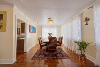 Classic dining rm, has Chand, opens to Living area