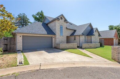 The home has a 2 car spacious garage with a storm 