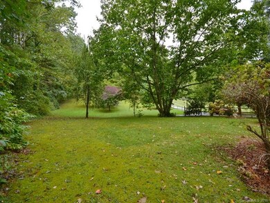 from the lot beside the home, looking back towards