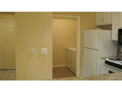 Laundry Room behind Kitchen area. Washer and Dryer