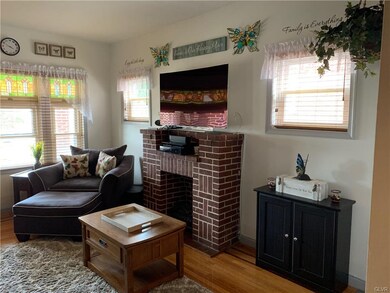 Oak floors and decorative fireplace