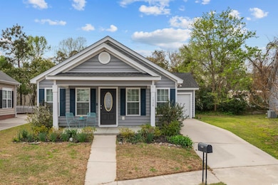 Bungalow-style home with an attached garage, a fro