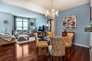 Modern, neutral colors showcase this living room/d