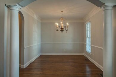 Covered front porch sports park views and invites neighborly conversations, and this dining space awaits future gatherings.  There’s not much left for you to do in this freshened home.