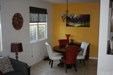 Living room opens to a nice dining area.