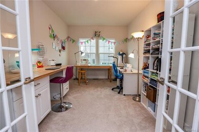 The hallway from the Foyer leads into the Office/S