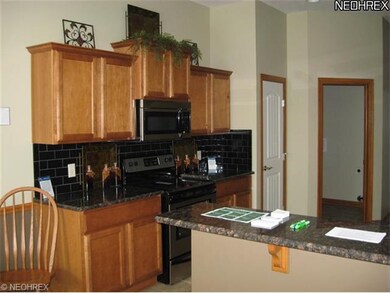 Another view of the beautiful maple kitchen and st