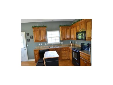 Large kitchen, new door to deck, great cabinets, l