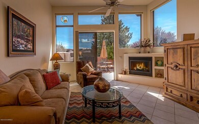 Living Room w/Fireplace and Courtyard