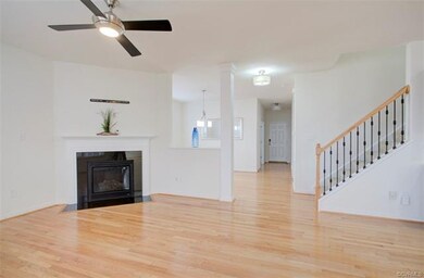 Family Room, Gas fireplace, ceiling fan.  View loo