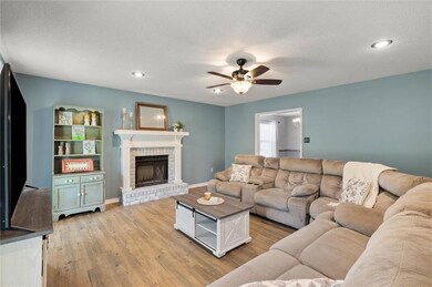 GREAT ROOM WITH WOOD BURNING FIREPLACE