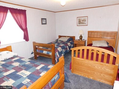 The larger of the two bedrooms is set up as a bunk