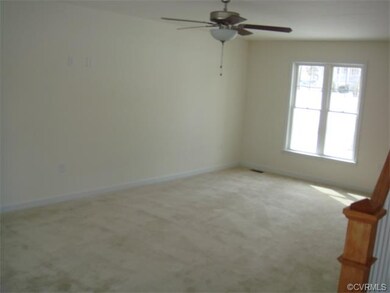 Living Room with ceiling fan and light