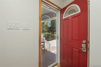 This front door offers a keypad at handle for entry access.