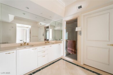 Full bathroom featuring double vanity, ornamental