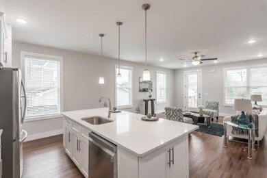 Open floorpan with kitchen flowing into the living