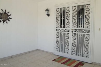 TILED ENTRY WITH SECURITY DOORS