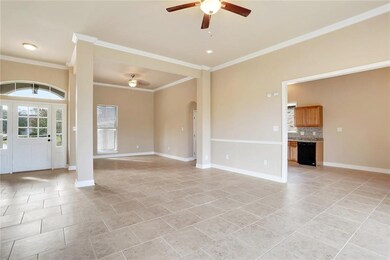 Living room open to dining room