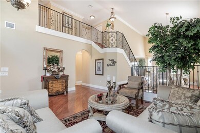 Gorgeous 24ft high vaulted ceilings at entry. Open