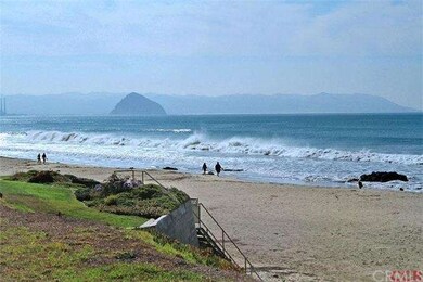 View of Morro Rock from front yard, living room, d