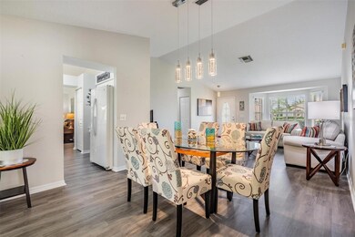 Dining area view of kitchen and living room