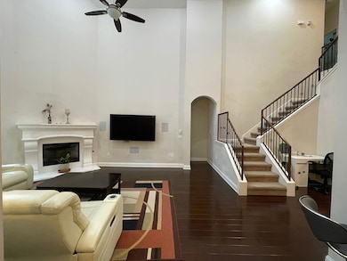 Living area featuring a towering ceiling, ceiling
