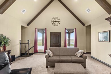 Large Living with beamed Cathedral 19' Ceiling.