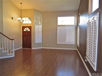 Laminate wood flooring and plantation shutters in 