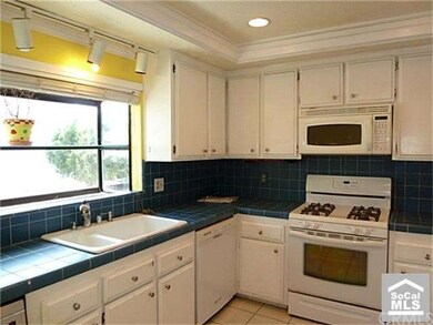 Kitchen has big sunny window facing east.