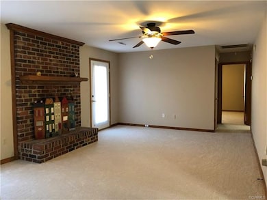 Family Room with wood burning fireplace.