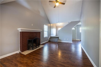 You'll enjoy the wood burning fireplace on those chilly winter evenings, while the ceiling fan keeps you cool in the warmer weather.