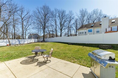 Patio and Tree Lined Yard