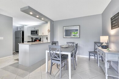 811 Sky Pine Way unit 61, Greenacres, FL 33415 - photo 2