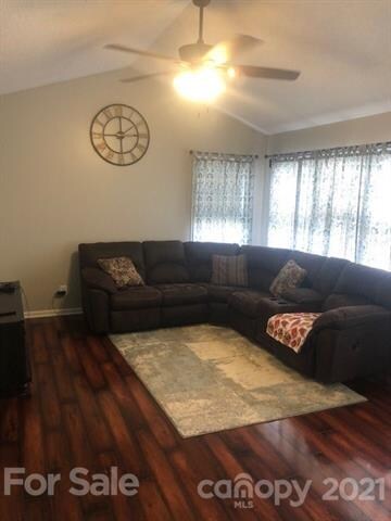 Very inviting living room with vaulted ceilings