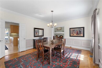 The dining room is adjacent to the great room and 