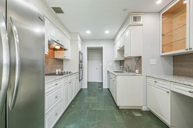 Updated kitchen features granite counters, stainle