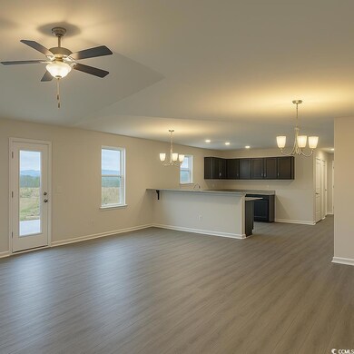 Unfurnished living room featuring baseboards, ceil