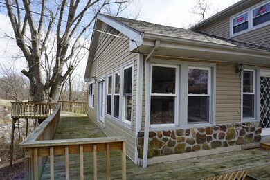 The wrap around deck on this home sets the perfect