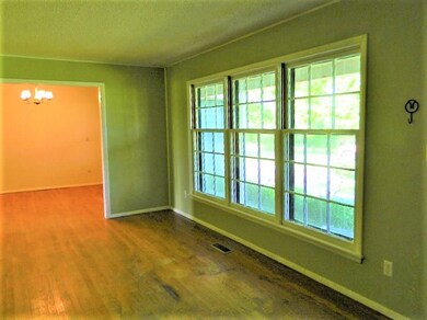 Living room with original hard wood flooring in so